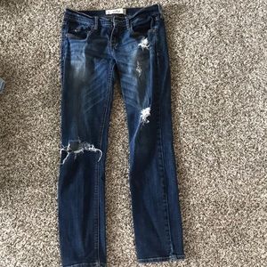 Dark wash, ripped jeans